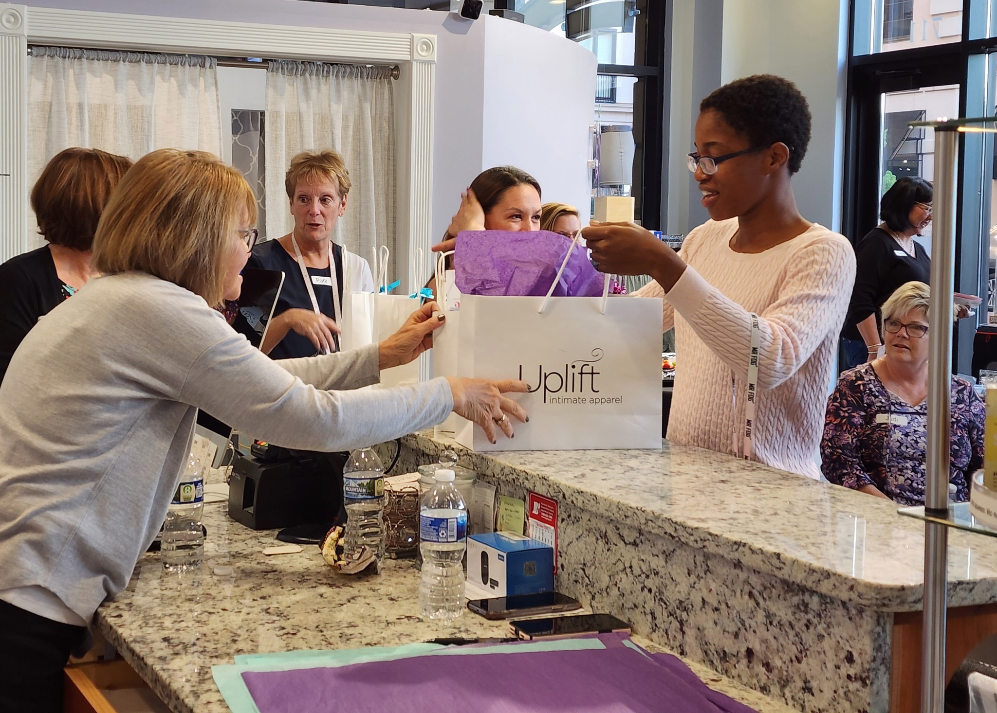 Women getting bra in support of the Dove Project